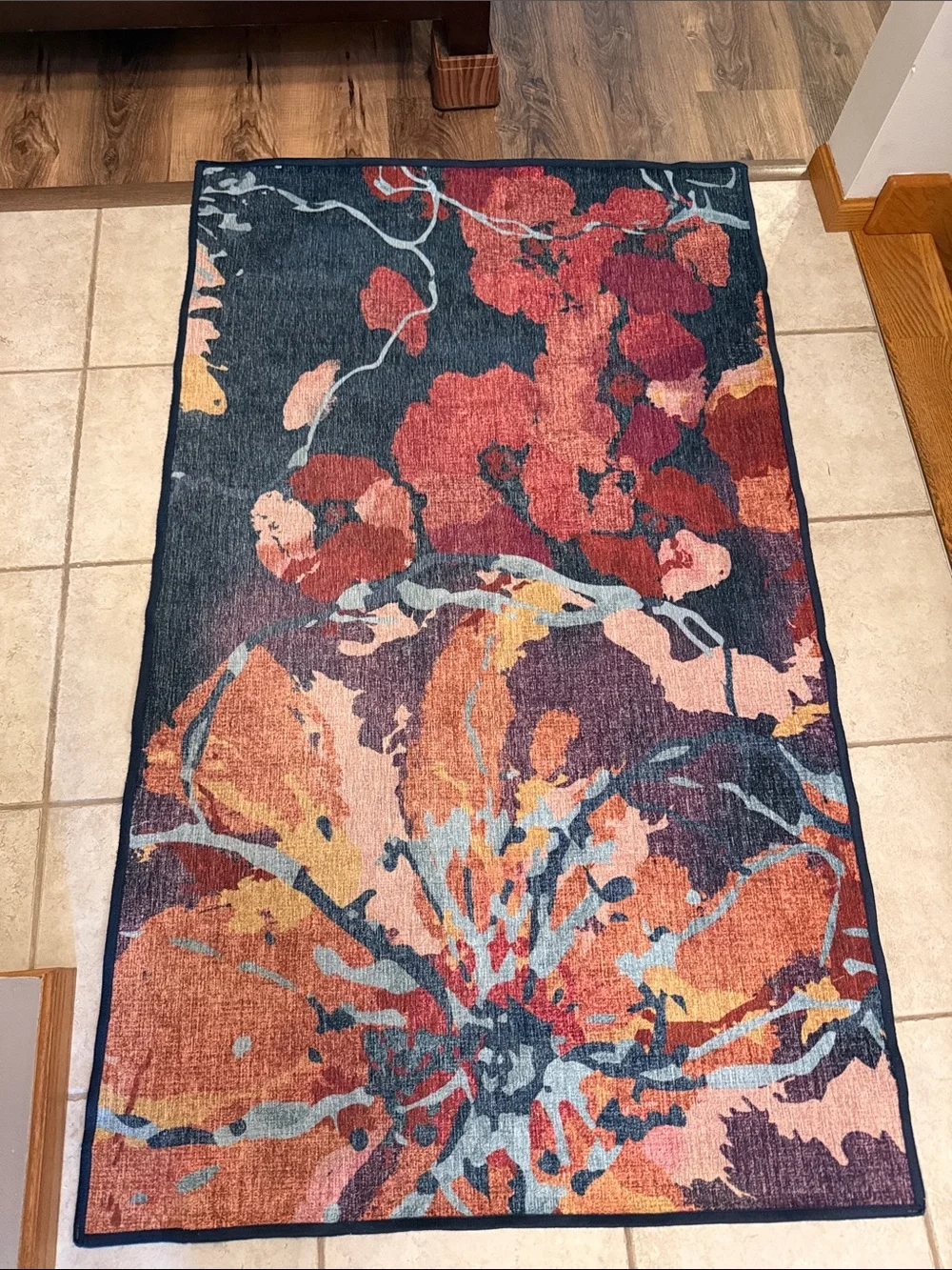 Ruggable flat woven watercolor floral rug in Navy and Coral. Cover only